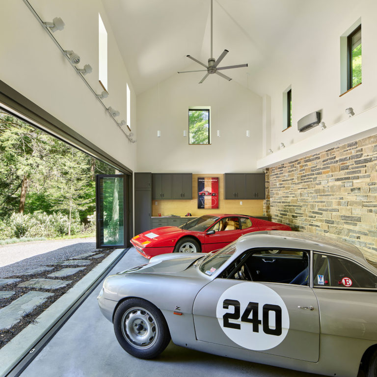 vintage car garage with telescoping glass doors open