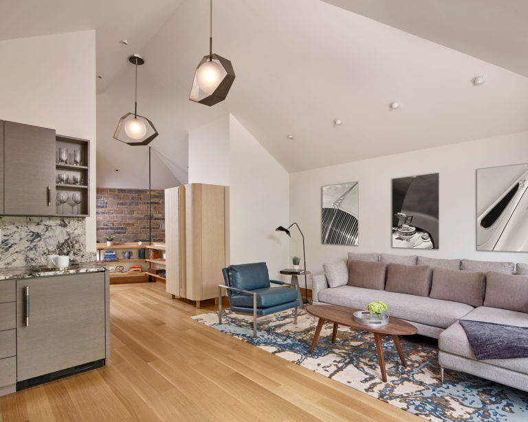 guest suite sitting area in vintage car garage