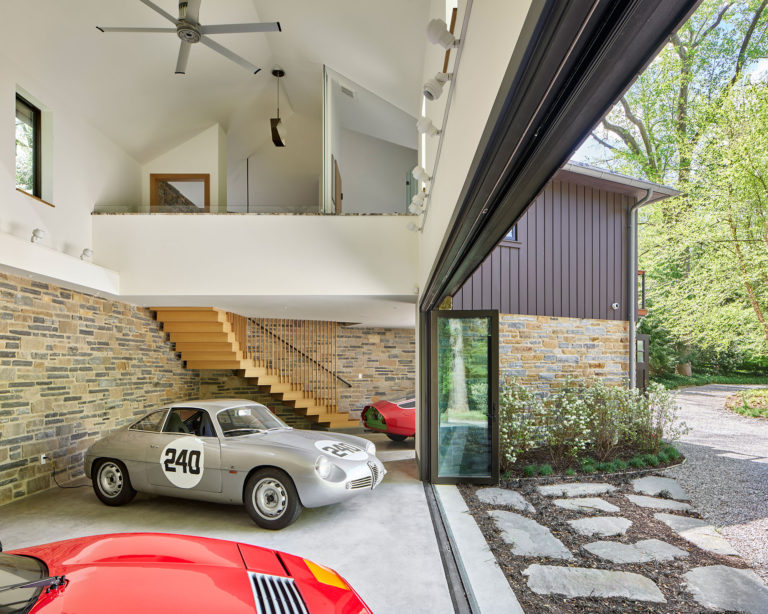 vintage car garage with telescoping glass doors