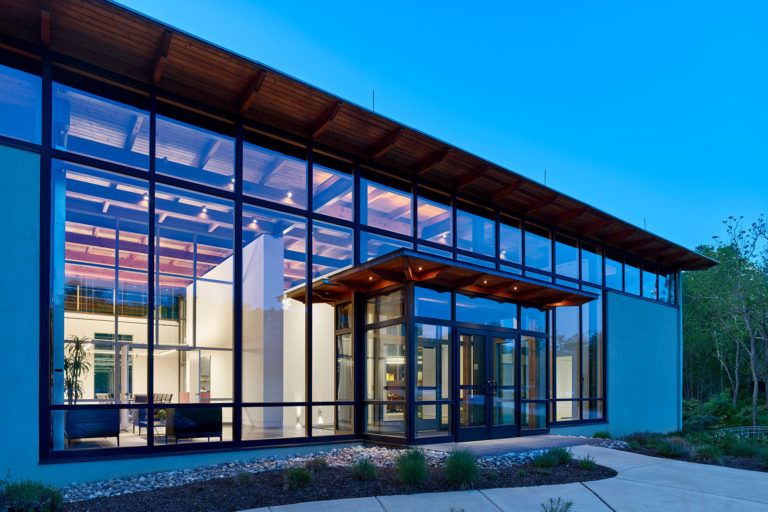 entry to modern office building at dusk