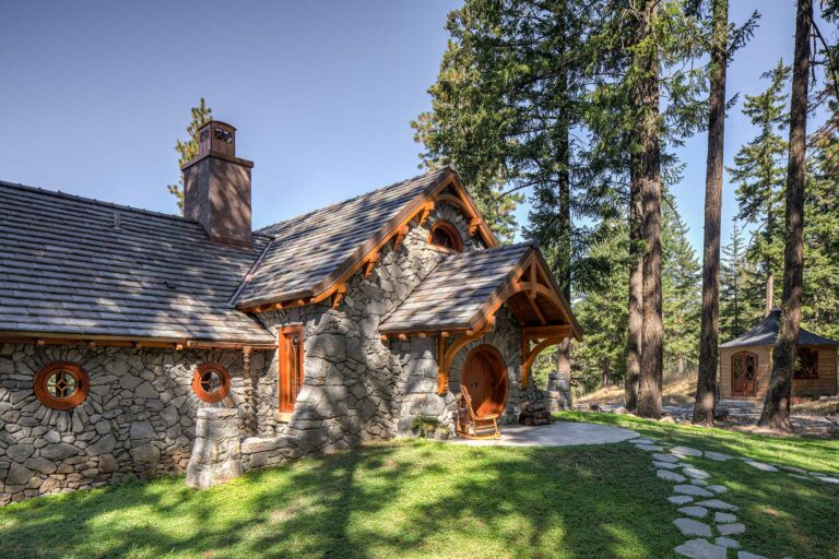 hobbit house view of front elevation and outbuilding