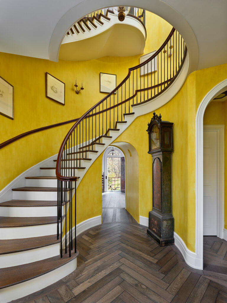 Big Bend elliptical stair with view through house