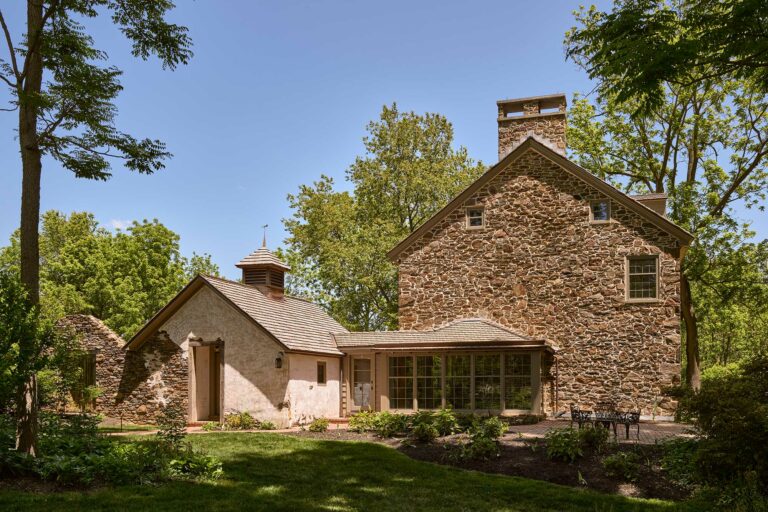 Side elevation with spring house and covered porch addition at Big Bend in Chadds Ford Pennsylvania