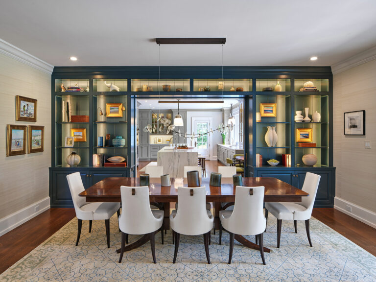 Dining room with built in display shelving painted blue