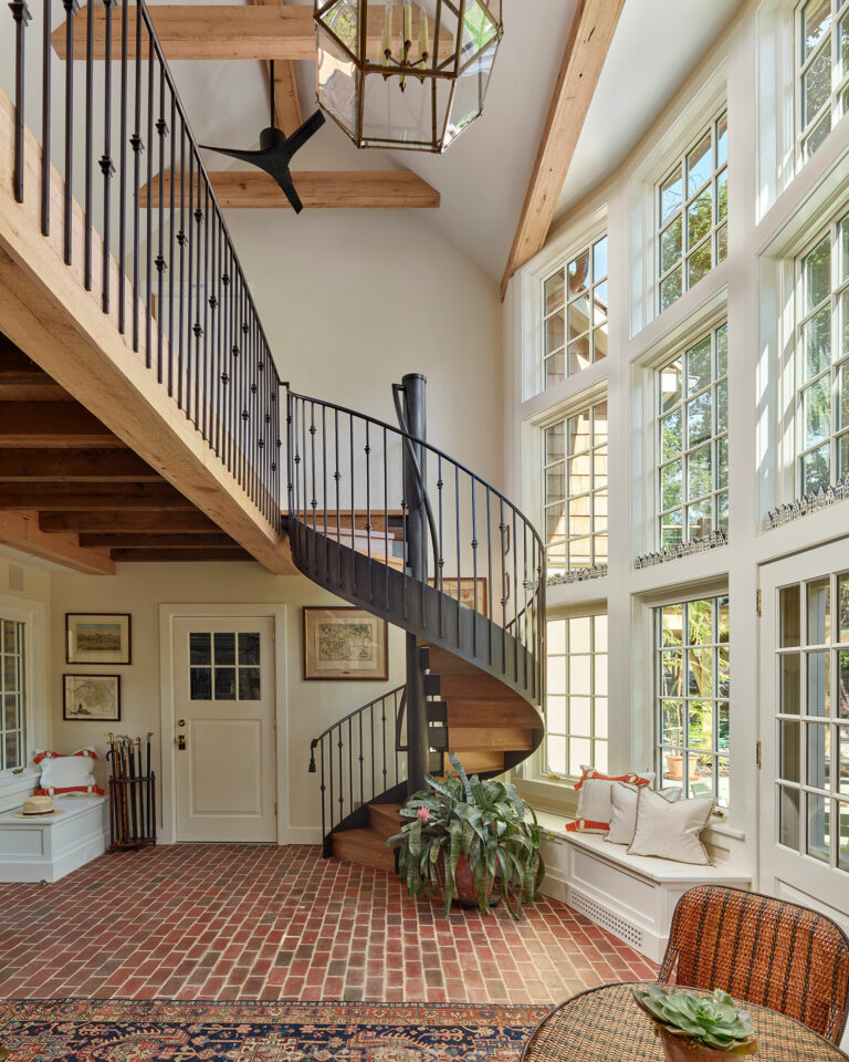 Bright and airy atrium addition linking existing cottage in Gladwyne to a new garage