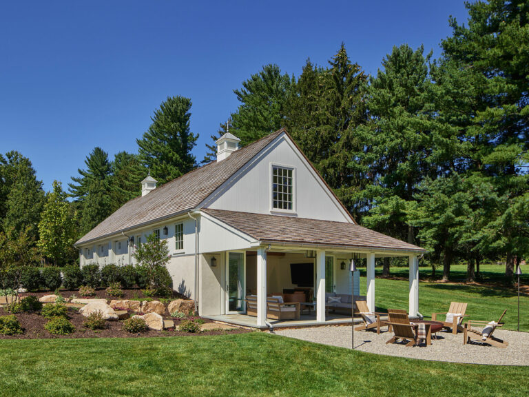 Garage with recreation room, covered patio and fire pit at Evergreen Farm