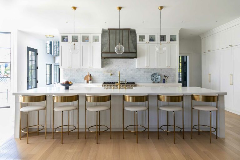 white kitchen with large white island in home in Fort Washington, Pennsylvania