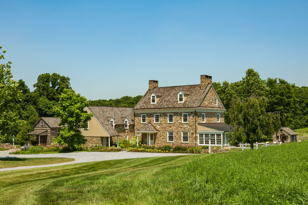 Front elevation of Honor Farm, a stone farmhouse in Kennett Square