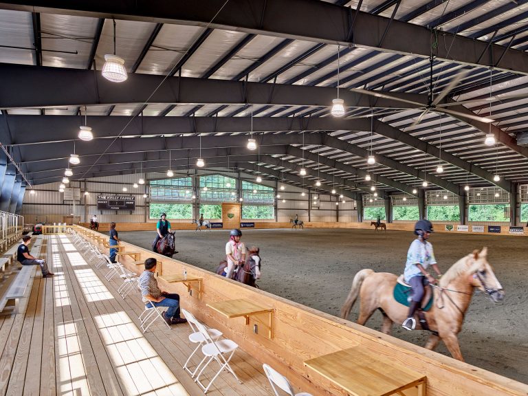 Chamounix Stables McCausland Arena for Work to Ride program interior spectator area and indoor arena