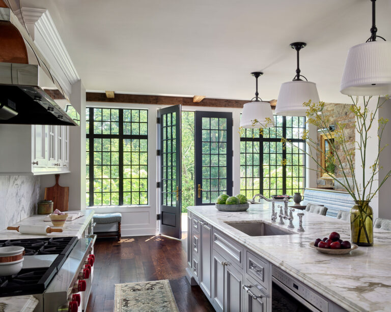 Kitchen and doors to terrace in Main Line Manor in Gladwyne