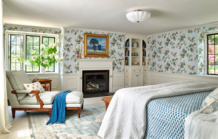 Primary bedroom with fireplace and built ins in Main Line Manor in Gladwyne