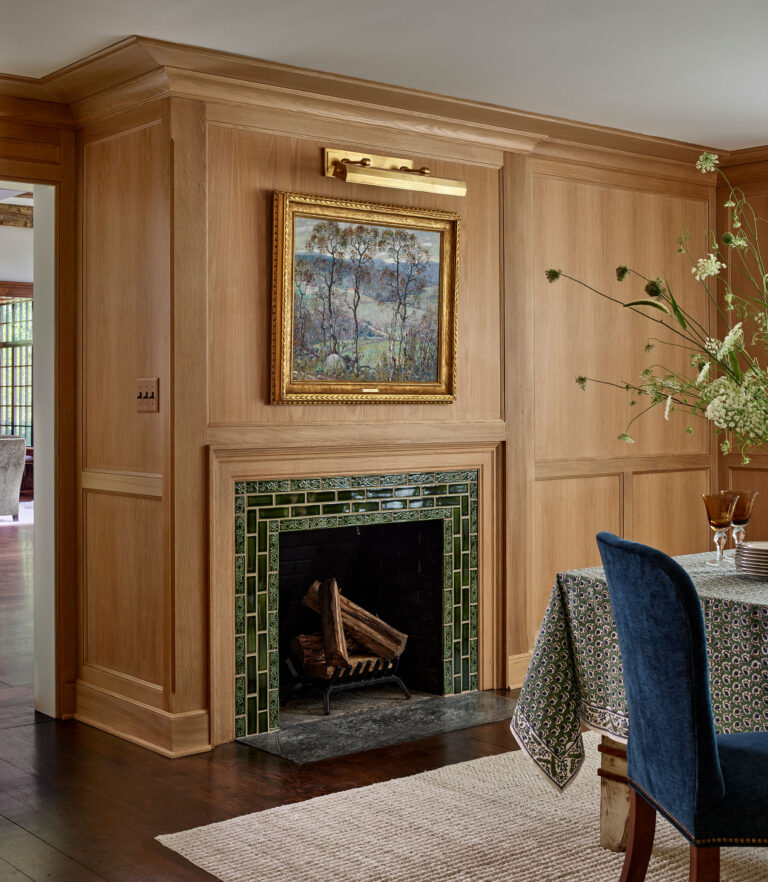 Fireplace and custom millwork in dining room in Main Line Manor in Gladwyne