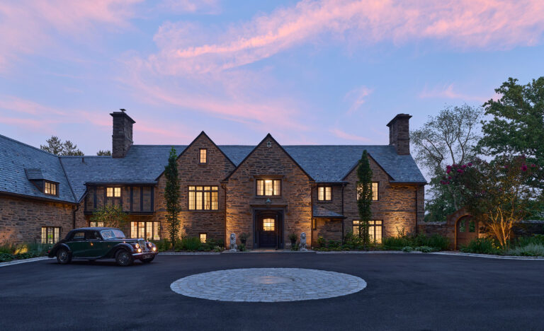 Entry court at dusk at Main Line Manor in Gladwyne