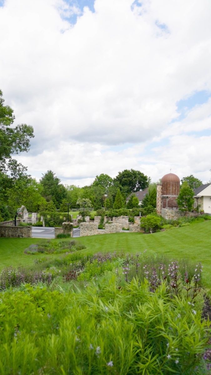 Taking cues from the surrounding farms and an existing barn ruin on